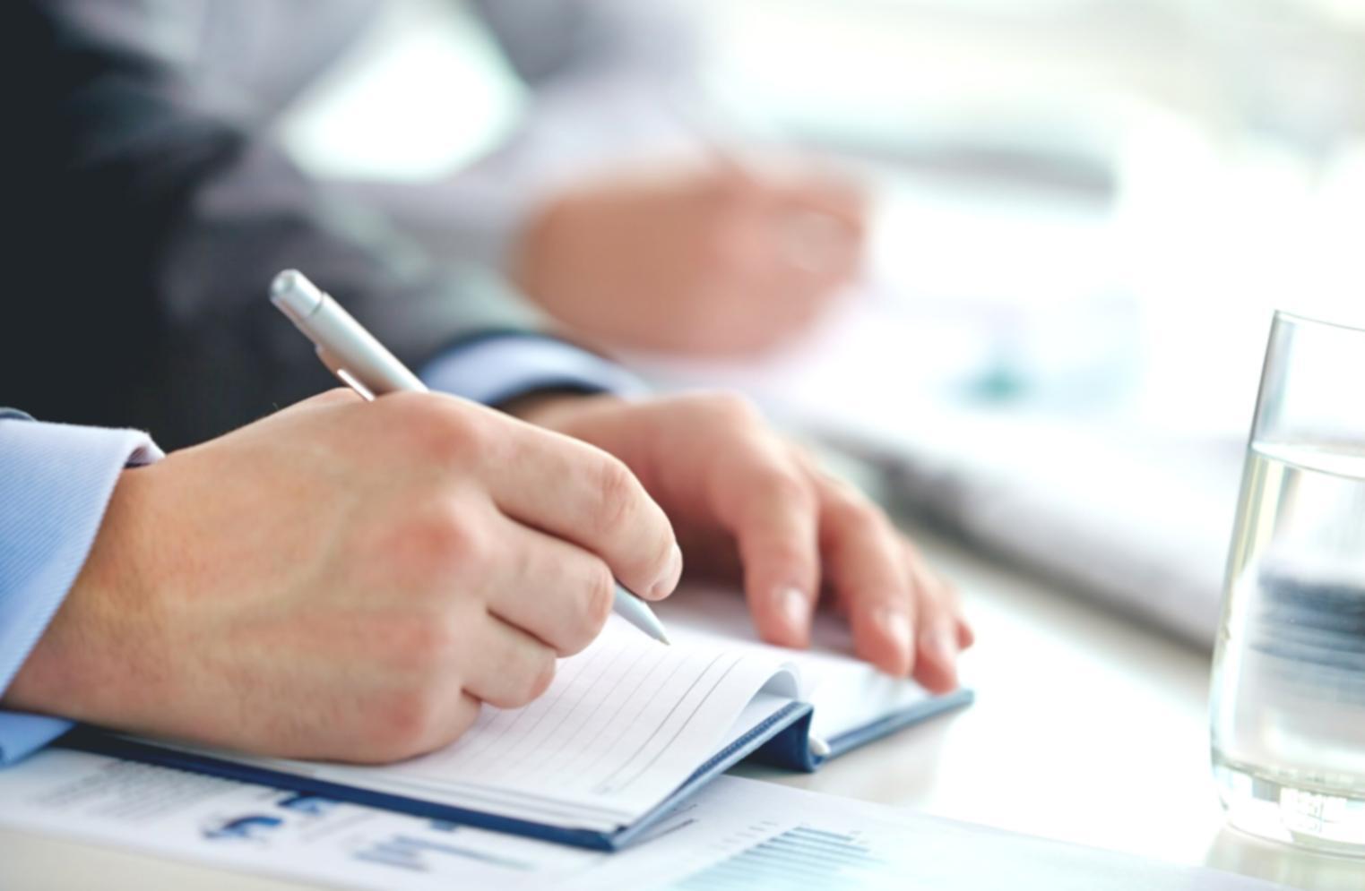 Software development team collaborating on test case documentation